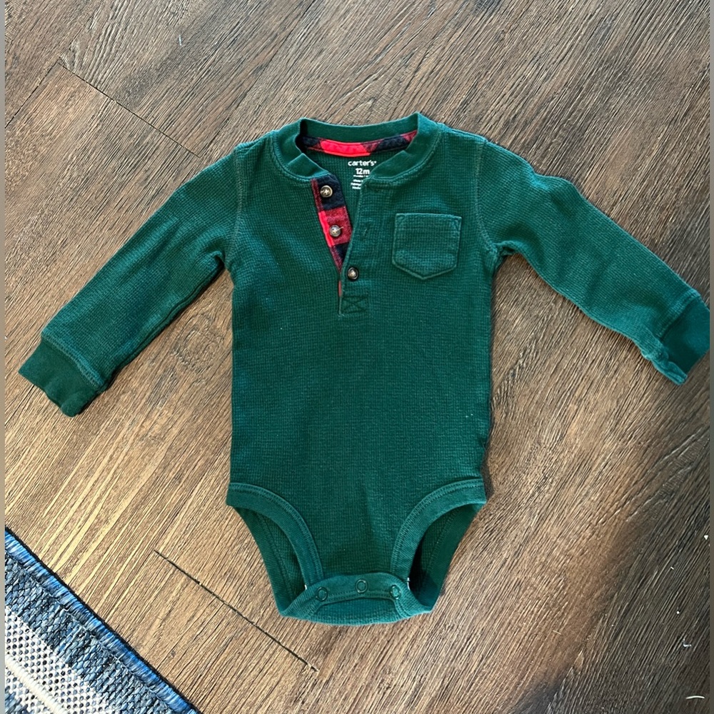 Size 12 months Carters long sleeve forest green onesie.  Thermal waffling.